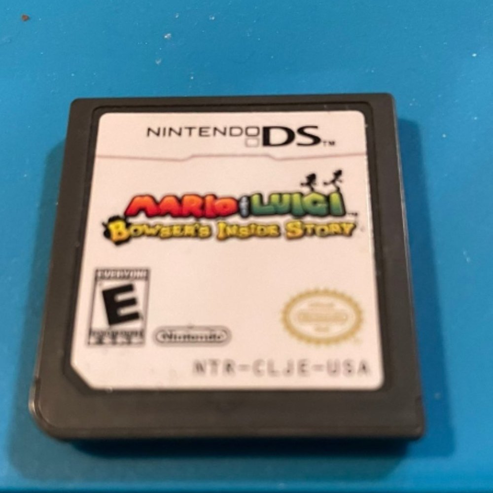 WITH strategy guide & Mario and Luigi Bowser's Inside Story for Nintendo DS!!!!